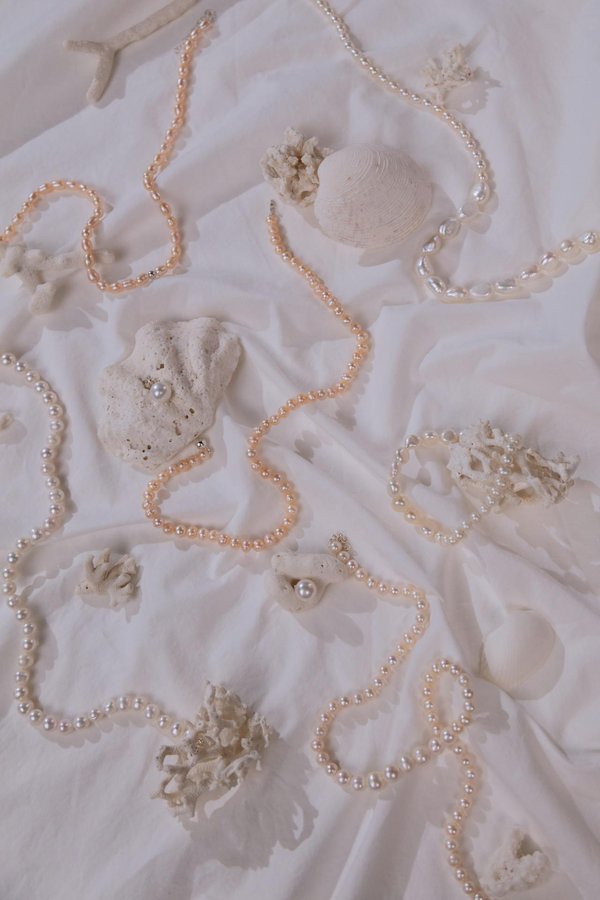 Comment choisir une croisière qui permet de visiter des fermes de perles en Polynésie française?